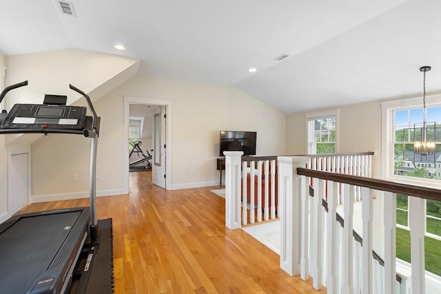 81 Hanover Rd, Carlisle, MA 01741 - exercise room featuring vaulted ceiling, light wood finished floors, a chandelier, baseboards, and recessed lighting