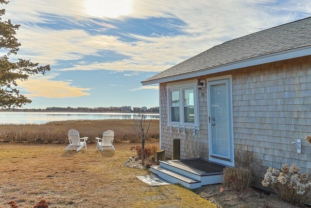 exterior space with a water view