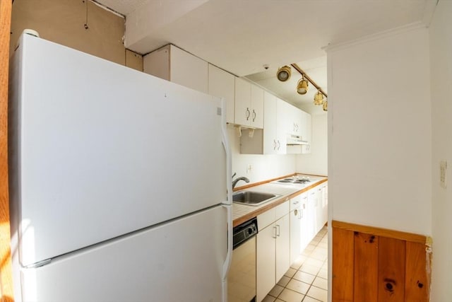 kitchen featuring light countertops, white cabinets, a sink, white appliances, and under cabinet range hood