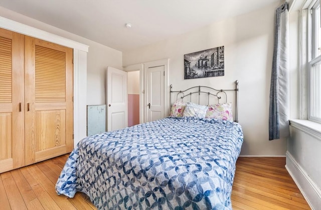 bedroom featuring hardwood / wood-style flooring