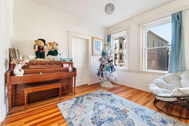 sitting room with light hardwood / wood-style floors