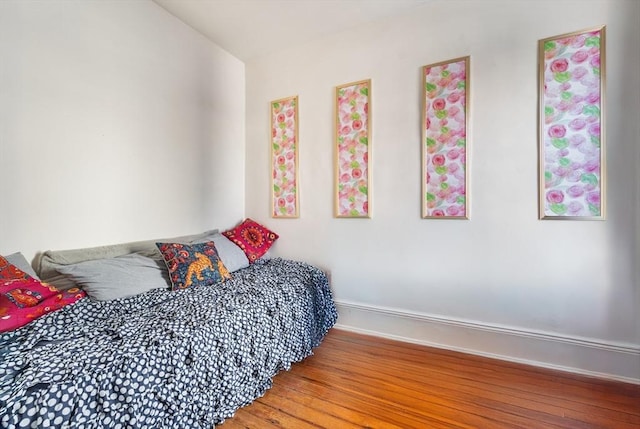 bedroom featuring hardwood / wood-style floors