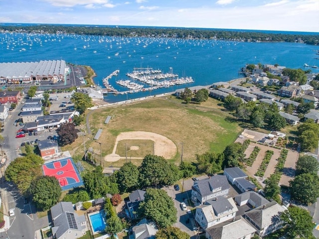 birds eye view of property featuring a water view