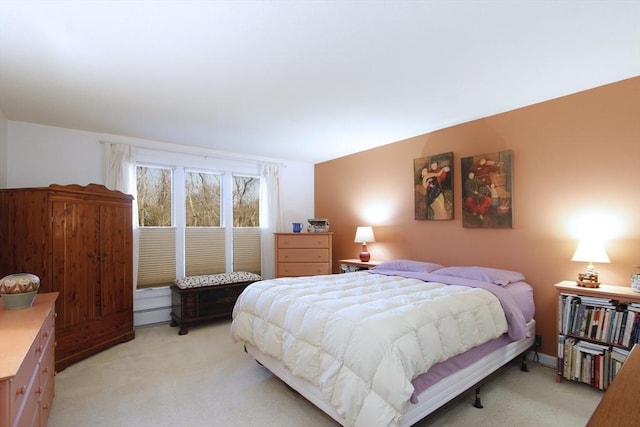 bedroom with light carpet
