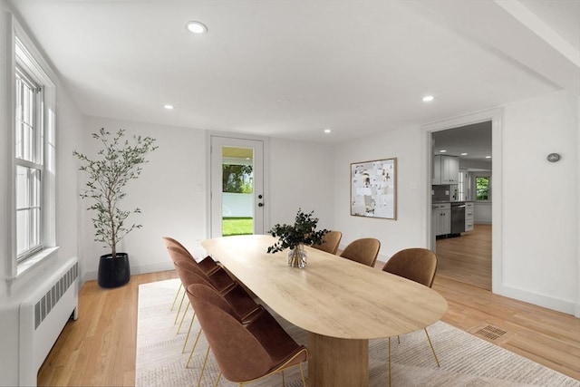 443 Great Plain Ave, Needham, MA 02492 - dining room with radiator heating unit, recessed lighting, light wood finished floors, and baseboards