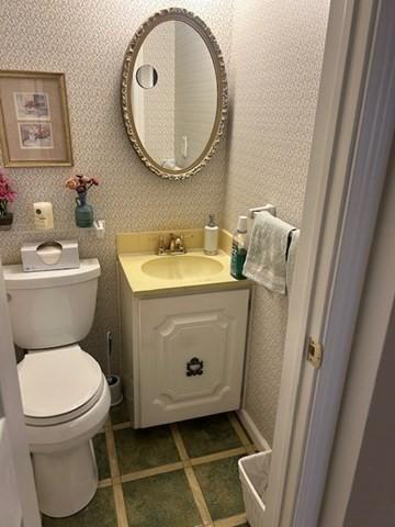 56 Granby Hts Unit 56, Granby, MA 01033 - bathroom with toilet, vanity, and tile patterned flooring