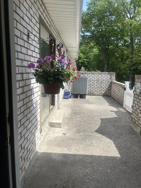 56 Granby Hts Unit 56, Granby, MA 01033 - view of patio with cooling unit