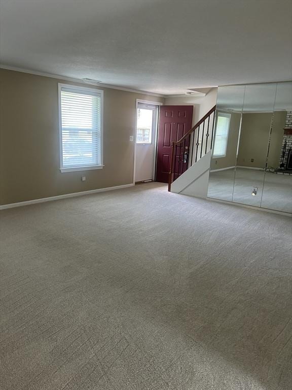 56 Granby Hts Unit 56, Granby, MA 01033 - carpeted empty room featuring baseboards, crown molding, and stairs