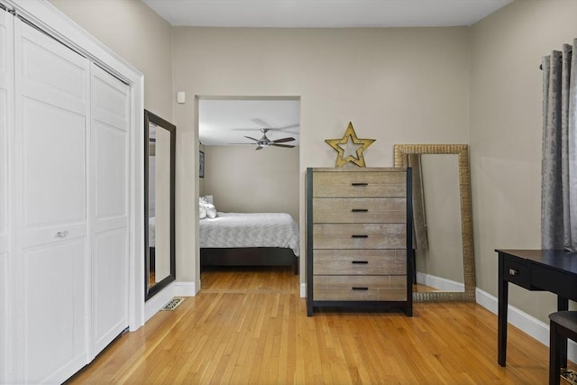 12 Willow St, Wakefield, MA 01880 - bedroom with light wood finished floors and a closet