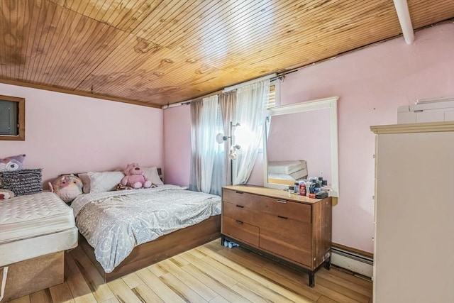 163 Lockland Ave, Framingham, MA 01701 - bedroom with wooden ceiling, a baseboard radiator, and light wood-style flooring
