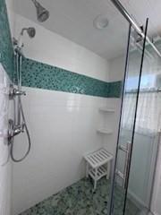 full bath featuring a stall shower