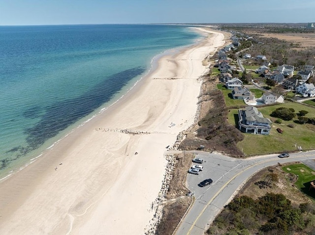 aerial view with a view of the beach and a water view