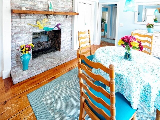 dining space featuring wood-type flooring