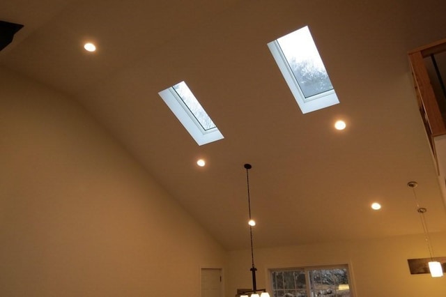 interior details featuring a skylight and recessed lighting