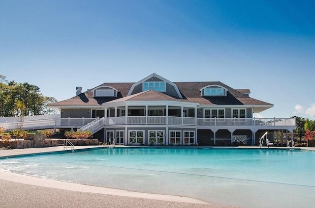 view of pool with a fenced in pool