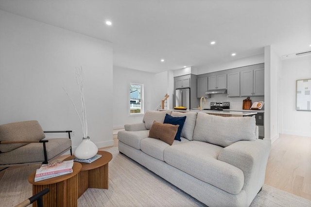 30A Emerald Rd Unit A, Nahant, MA 01908 - living area with recessed lighting, baseboards, and light wood finished floors