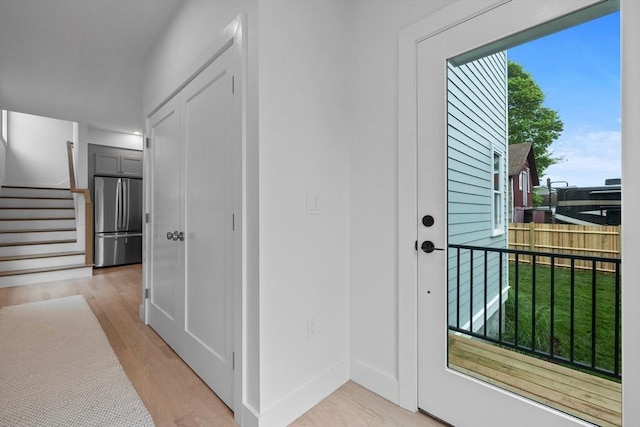 30A Emerald Rd Unit A, Nahant, MA 01908 - entrance foyer with light wood finished floors, stairway, and baseboards