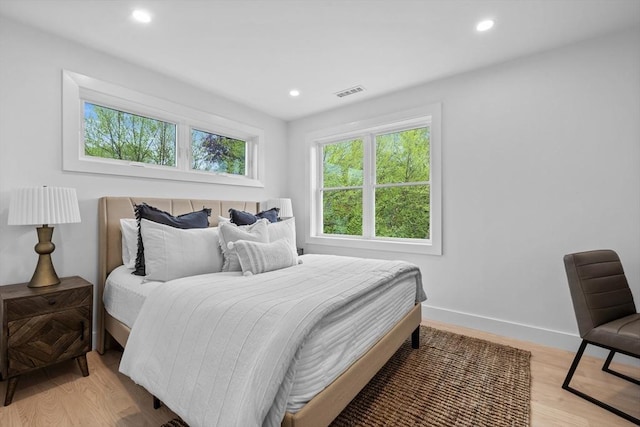 30A Emerald Rd Unit A, Nahant, MA 01908 - bedroom featuring multiple windows, recessed lighting, light wood-type flooring, and baseboards
