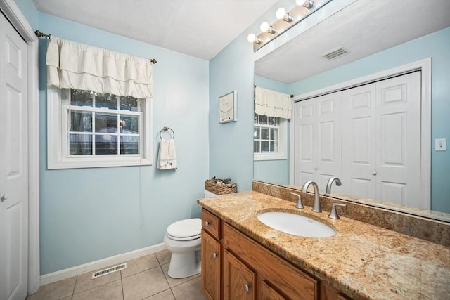 12 Wilson St, Randolph, MA 02368 - bathroom featuring vanity, tile patterned floors, and a closet