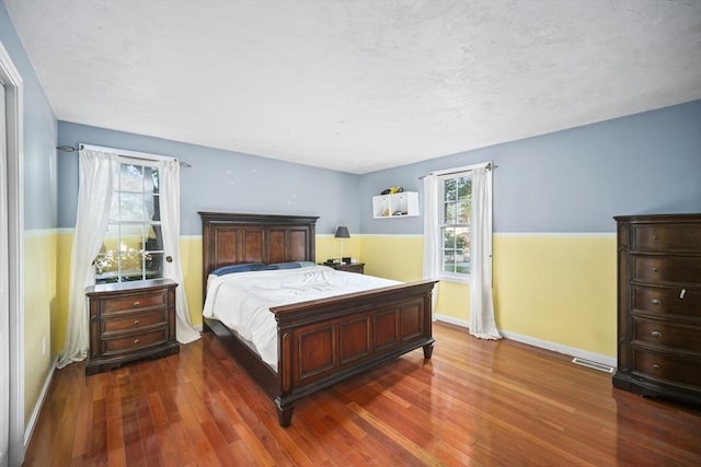 12 Wilson St, Randolph, MA 02368 - bedroom with multiple windows and wood finished floors