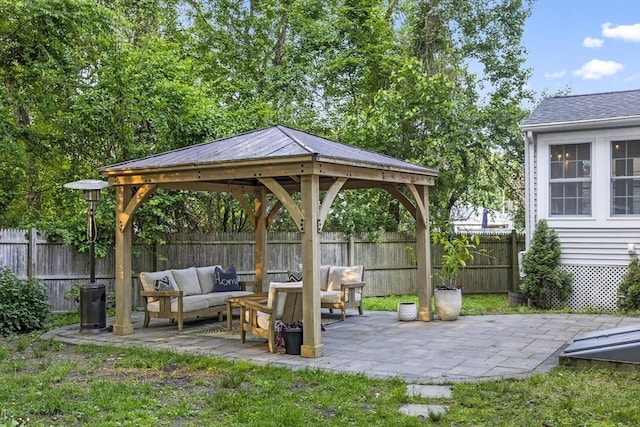 12 Wilson St, Randolph, MA 02368 - fenced backyard featuring an outdoor hangout area, a gazebo, and a patio area