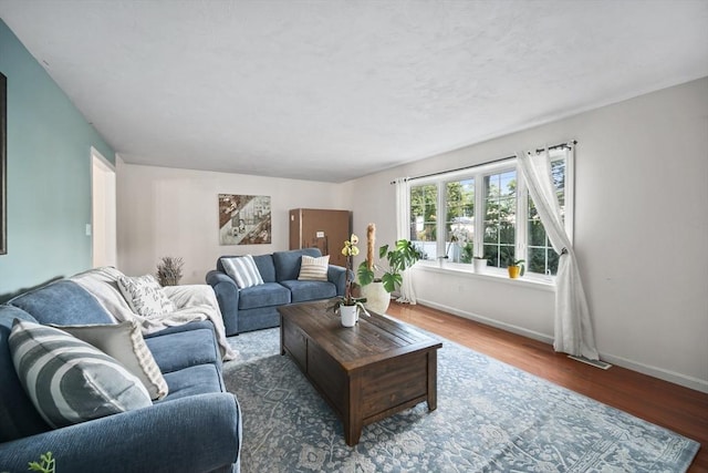 12 Wilson St, Randolph, MA 02368 - living area featuring wood finished floors and baseboards