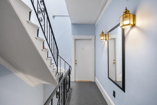 100 Charles St Unit 5, Boston, MA 02114 - corridor featuring stairway, dark carpet, and ornamental molding
