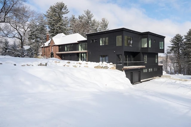 view of snow covered house