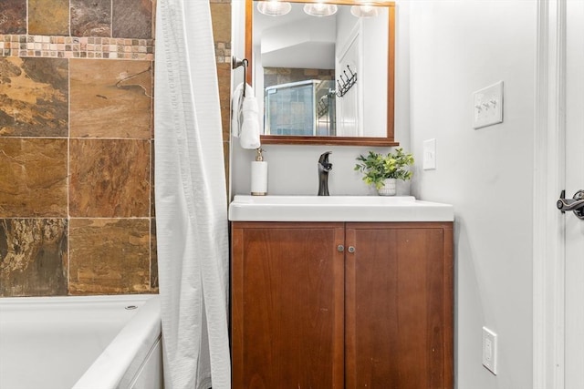 bathroom with vanity and shower / bath combo with shower curtain