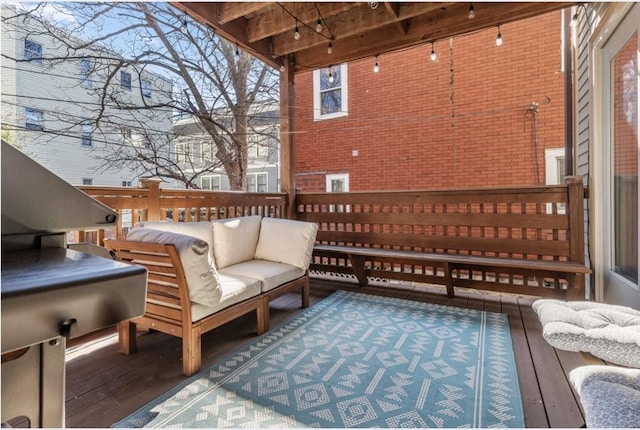 wooden deck with an outdoor hangout area