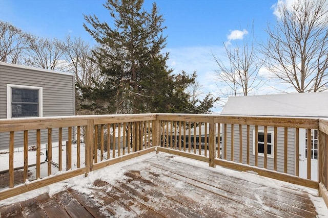 view of snow covered deck