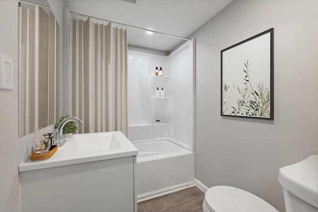 full bathroom with vanity, wood-type flooring, shower / bath combination with curtain, and toilet