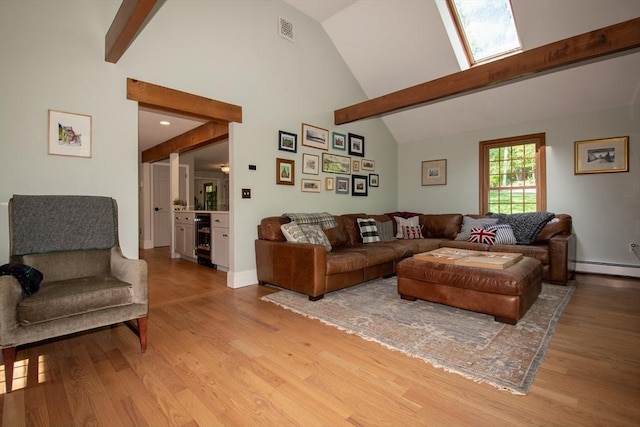 living room with beamed ceiling, light wood-style flooring, beverage cooler, high vaulted ceiling, and a baseboard radiator