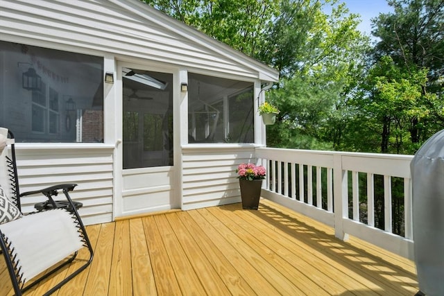 wooden terrace with a sunroom
