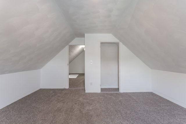 6 Smith St, Taunton, MA 02780 - additional living space featuring vaulted ceiling and carpet floors