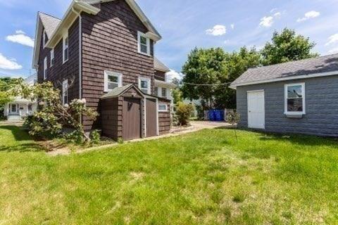 6 Smith St, Taunton, MA 02780 - back of house featuring a lawn