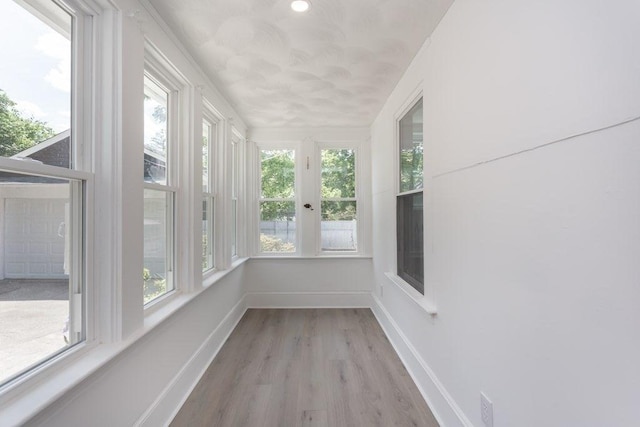 6 Smith St, Taunton, MA 02780 - unfurnished sunroom featuring wood finished floors and baseboards
