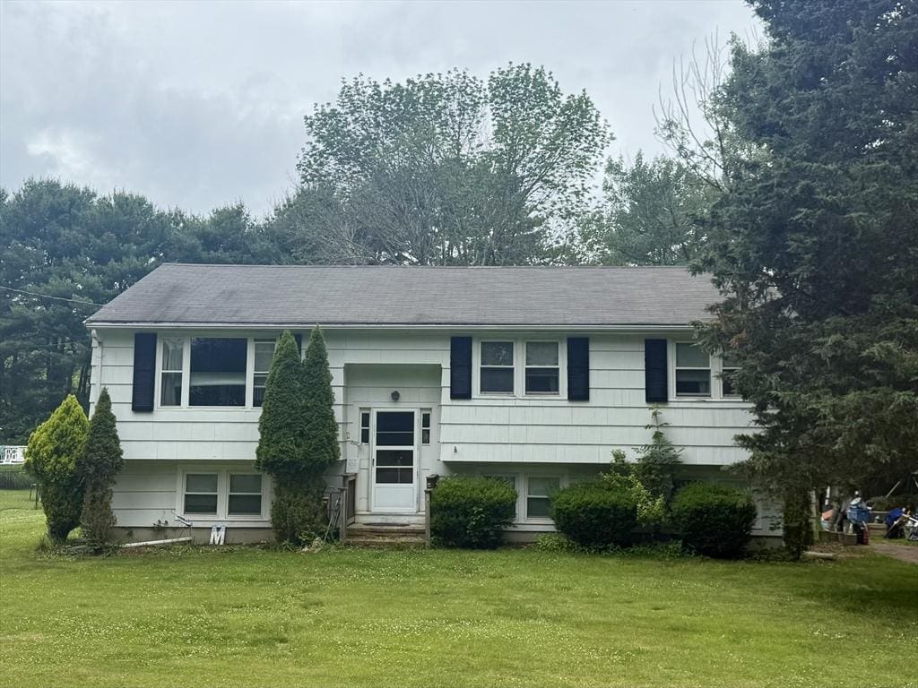 587 Bridge St, East Bridgewater, MA 02333 - split foyer home featuring a front lawn