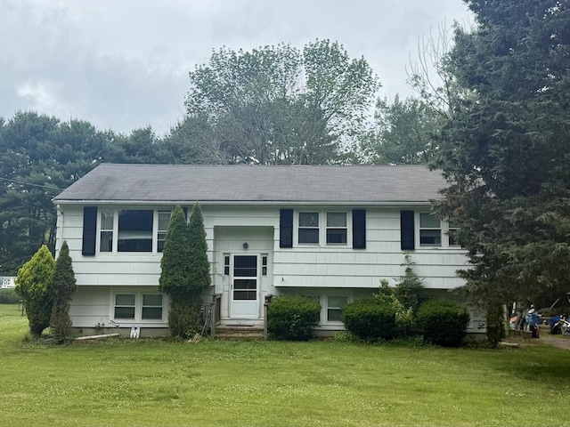 587 Bridge St, East Bridgewater, MA 02333 - split foyer home featuring a front lawn