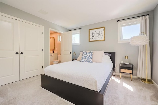 19 Millies Way, Sterling, MA 01564 - bedroom featuring light colored carpet, multiple windows, a closet, and ensuite bathroom