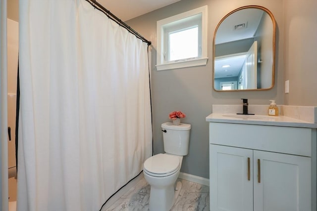 19 Millies Way, Sterling, MA 01564 - full bathroom with marble look tiles, toilet, vanity, baseboards, and curtained shower