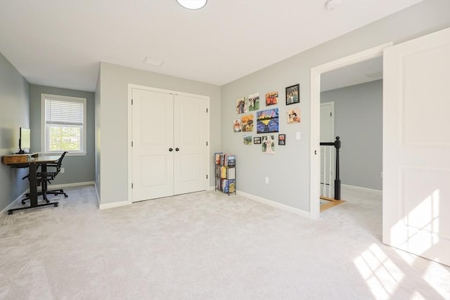 19 Millies Way, Sterling, MA 01564 - bedroom with light carpet, baseboards, a closet, and a desk
