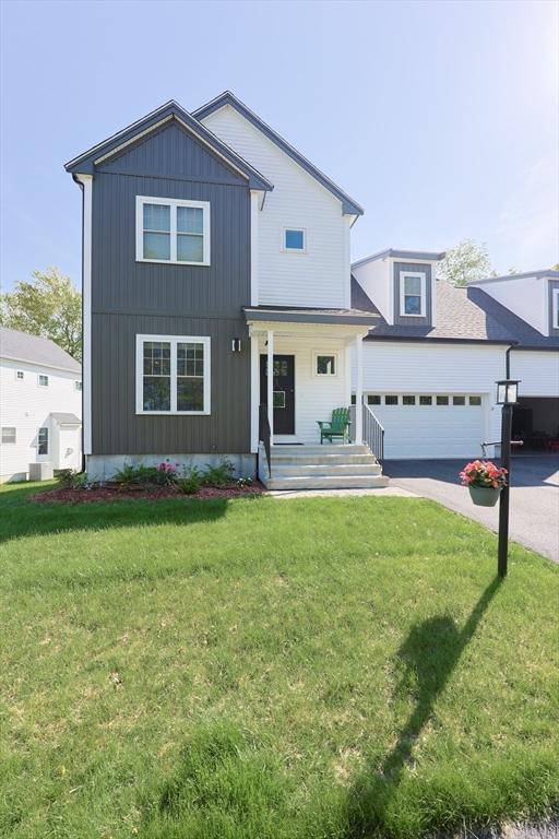 19 Millies Way, Sterling, MA 01564 - view of front of home featuring covered porch, driveway, and a front lawn