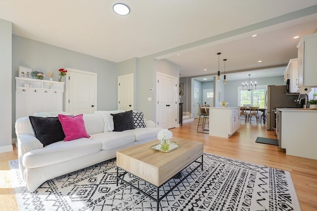 19 Millies Way, Sterling, MA 01564 - living room featuring light wood-type flooring, a chandelier, and recessed lighting