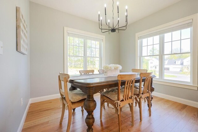 19 Millies Way, Sterling, MA 01564 - dining space with a chandelier, light wood-type flooring, and baseboards