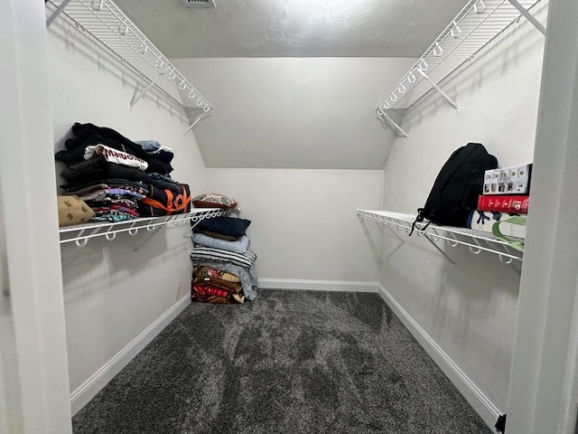 84 Murray Cir, Stoughton, MA 02072 - walk in closet featuring carpet flooring and vaulted ceiling