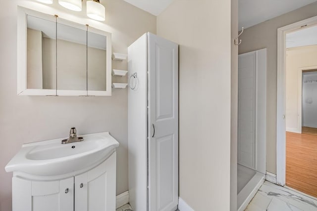 514 W Britannia St, Taunton, MA 02780 - full bathroom with a walk in shower, vanity, and marble finish floors