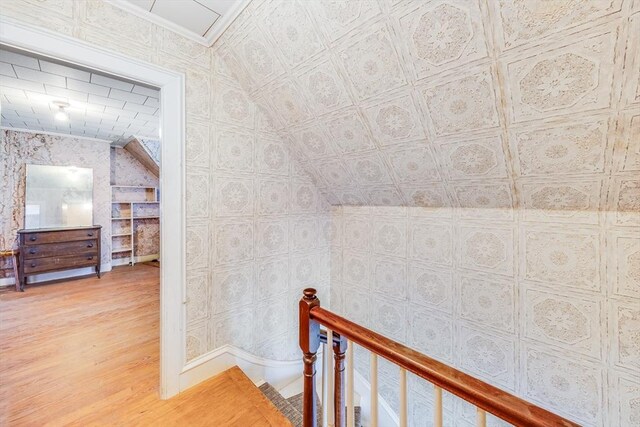 514 W Britannia St, Taunton, MA 02780 - corridor featuring an upstairs landing, light wood finished floors, and crown molding