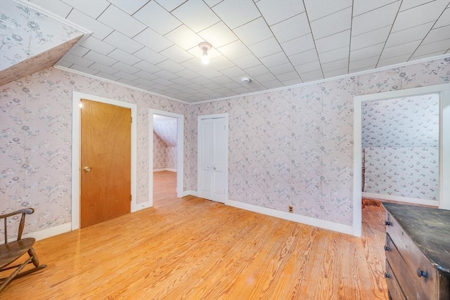 514 W Britannia St, Taunton, MA 02780 - additional living space featuring wood finished floors and wallpapered walls