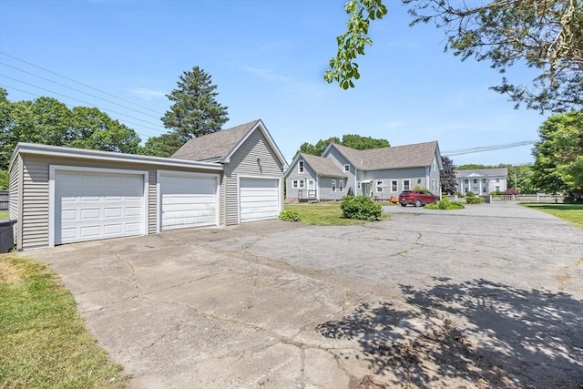 514 W Britannia St, Taunton, MA 02780 - view of front of home with a garage
